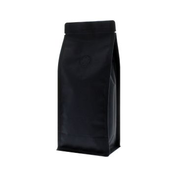 Matte black recyclable flat bottom coffee pouch with valve and tear notch.